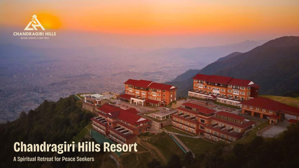 Aerial view of Chandragiri Hills Resort at sunset, offering panoramic vistas of Kathmandu Valley and serene mountain landscapes.