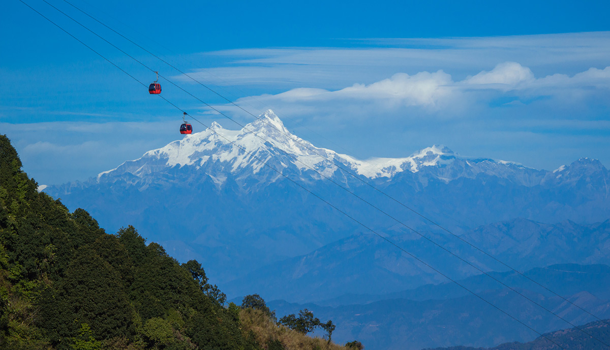 Chandragiri Hills cable car with snow capped peaks at the backdrop